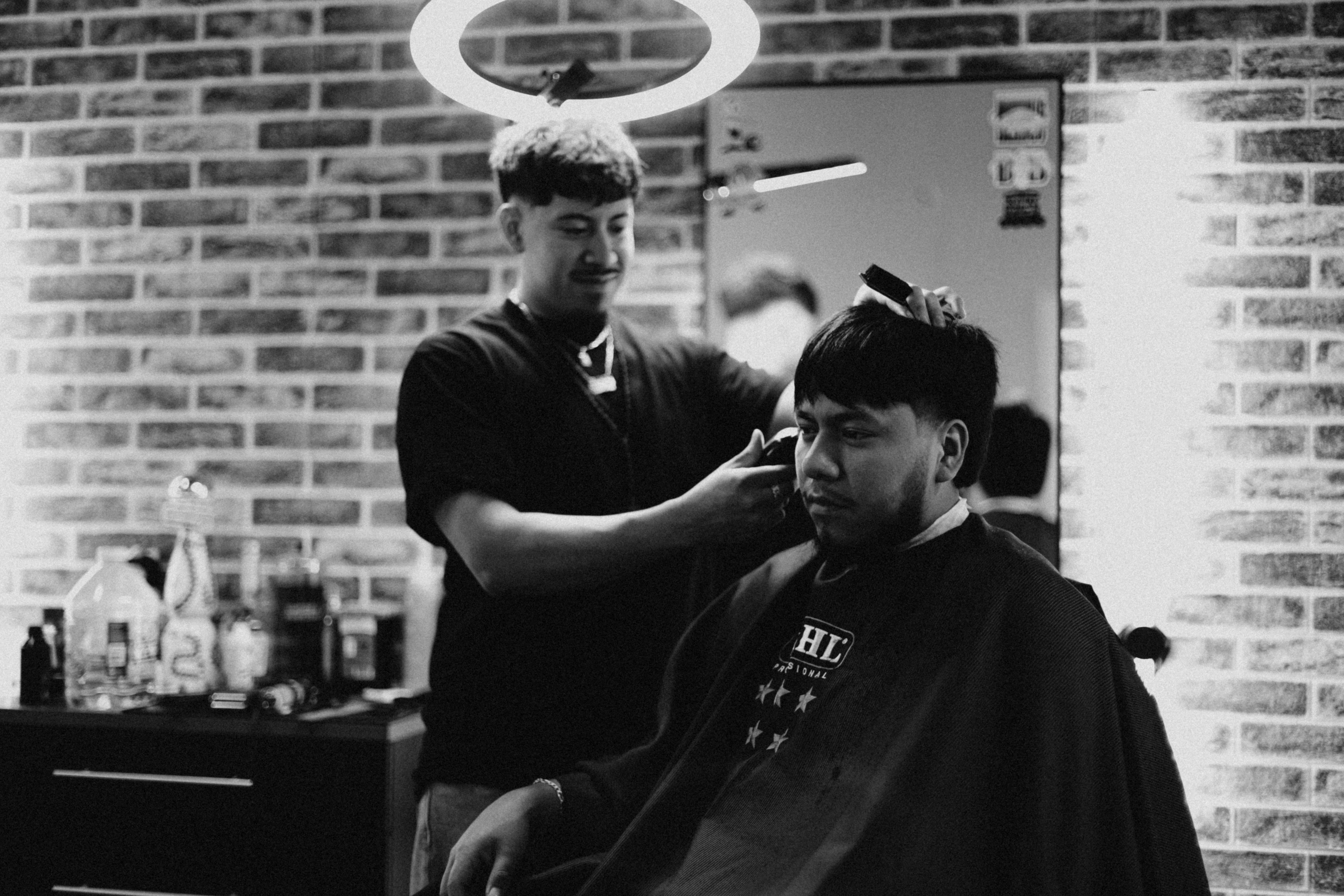 Barber consulting with client